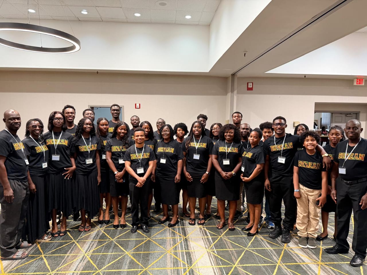 Berean Fellowship members together at a conference or retreat, wearing matching Berean shirts